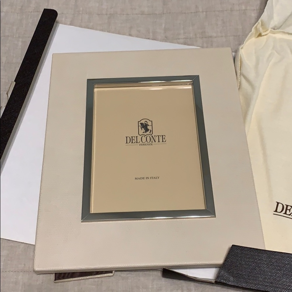 Delconte cream snakeskin pattern leather frame.